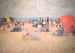 Francois Gall's "At the Beach". A crowded beach holds people of all ages, some shaded by colorful umbrellas done in red, blue, and yellow.